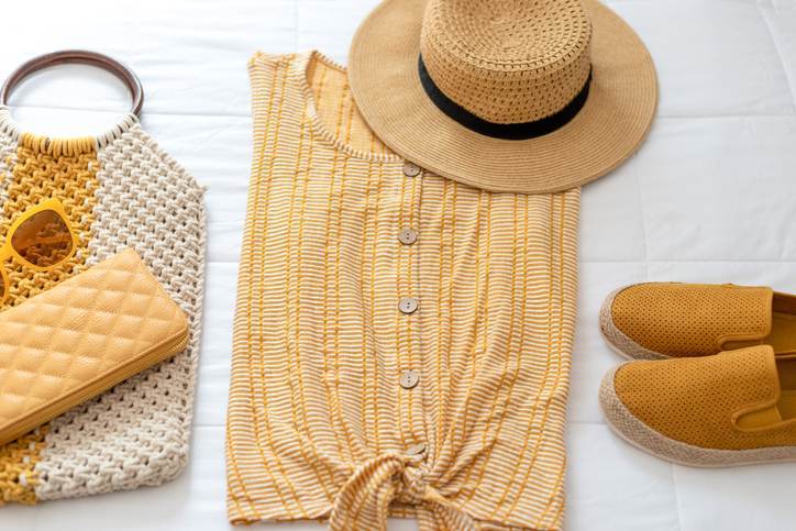 Summer fashion, outfit laid out on the bed